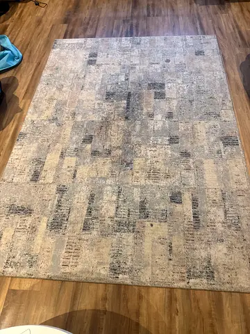 Light neutral abstract area rug