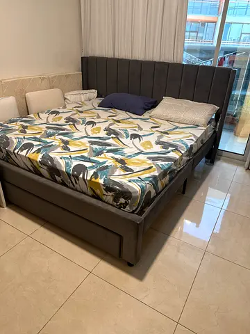 Grey upholstered double bed with headboard and huge storage - good condition, brand new