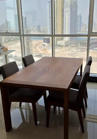 Indigo Living Solid Wood Dining Table with 6 Upholstered Chairs - Good Condition