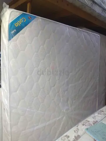 Queen Size Mattress - New, Wrapped Plastic