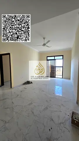 For rent in Ajman, first occupancy, in Al Jurf 3 on Sheikh Mohammed Bin Zayed Road: two bedrooms, a living room, three bathrooms, and a balcony. Rent