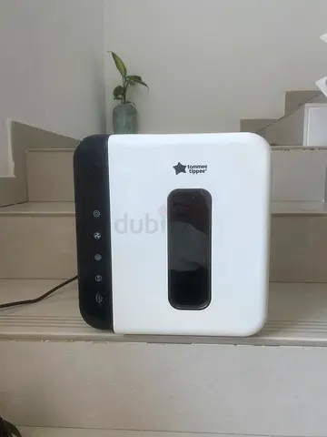 UV sterilizer for baby’s bottles , teether and toys.