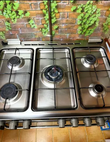 5-burner stainless steel gas stove top in good working condition