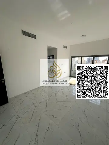 For rent in Al Jurf 3, Ajman, one bedroom and living room, first occupant, 2 bathrooms, balcony, master bedroom with wardrobe, close to the Chinese ma