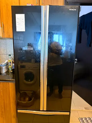 Hitachi Black Glass Double Door Refrigerator, with freezer and store compartment- Good Condition