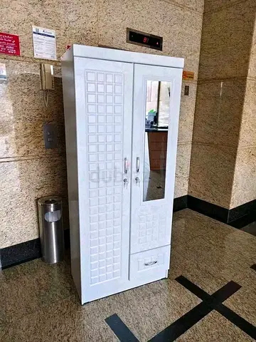 White Metal Wardrobe with Mirror and Bottom Drawer - Good Condition