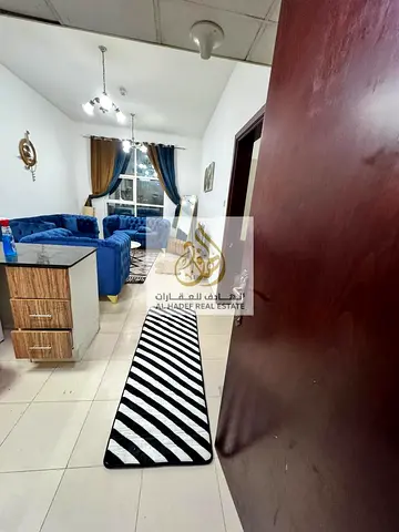 Monthly rent in Ajman, Al Nuaimiya 3, City Towers, opposite Grand Mall, near Dubai Islamic Bank. The building is for families. One bedroom and living