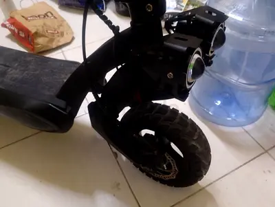 Used electric scooter with off-road front wheel and dual lights - good condition I perchas 3500
