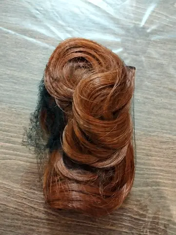 Brown clip-in hair extension