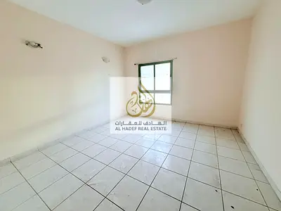 Two bedroom apartment for rent in Sharjah Al Nahda spacious layout free maintenance flexible payment