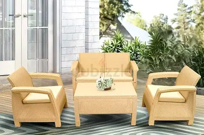 Brand New 4-piece beige rattan-style outdoor sofa set with coffee table