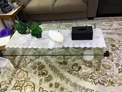 Glass coffee table with decorative glass legs