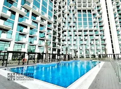Furnished Studio | Creek Views | Balcony | Pool & Downtown View