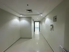 Luxury three-bedroom apartment with a living room for annual rent in Sharjah, Al Khan area | Parking