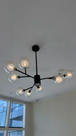 Modern black chandelier with 8 glass globe lights