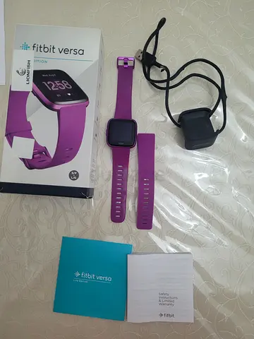 Fitbit Versa watch tracker (Purple) with Charger and Extra Strap - Good Condition