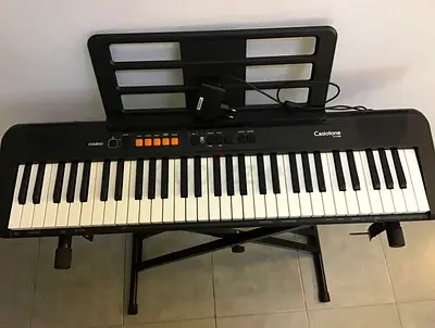 Casio Casiotone 49-key Keyboard with Stand and Power Adapter