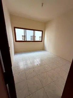 For rent Al Butina behind Nesto Sharjah 2BR hall central AC good location 26000 AED yearly 4 payment