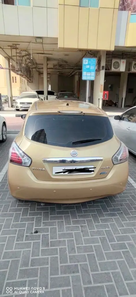 Nissan Tiida 2014 — photo 1 of 5