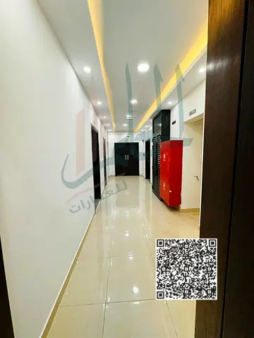 A great opportunity for monthly rent in Ajman Corniche: a spacious one-bedroom hall apartment with two bathrooms and a balcony, fully furnished with v