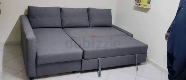 Grey L-shaped Sofa Bed with Storage - Excellent Condition