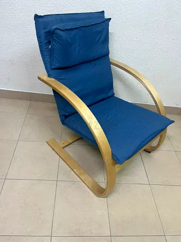 IKEA POÄNG rocking chair with birch veneer frame and blue cushion