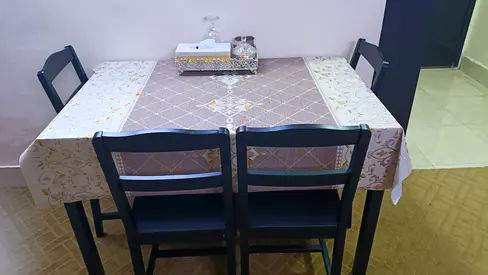 IKEA Wooden dining table with 4 chairs - good condition