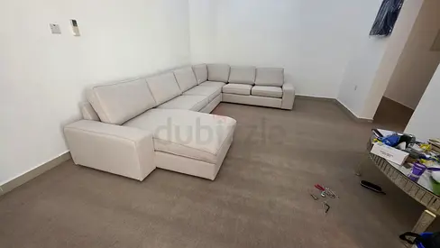 U-shaped sectional Kivik beige sofa