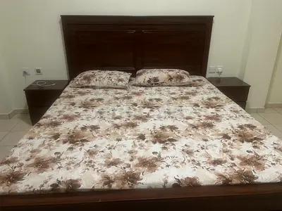 King size bed with side tables and dressing