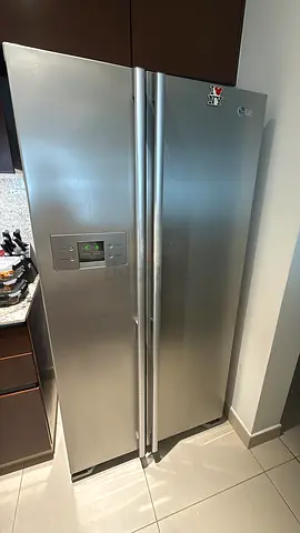 LG Side-by-Side Stainless Steel Refrigerator - Good Working Condition