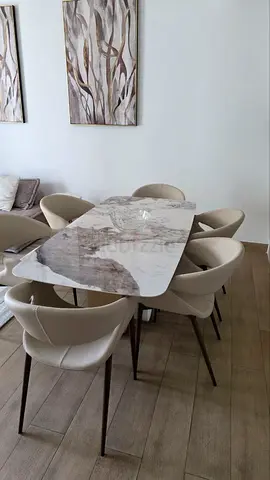 Marble-top dining table with 6 upholstered chairs - excellent condition