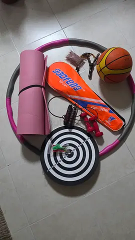 Mixed sports accessories bundle: basketball, yoga mat, hula hoop, target dartboard and more