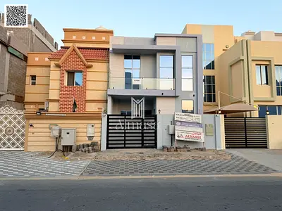 Luxury villa for rent, first occupancy, in one of Ajman's most prestigious areas, Al Zahia, behind