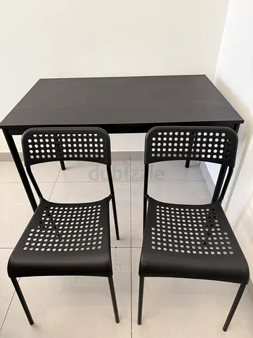 Minimal Black Dining Table with 2 Perforated Chairs - Good Condition