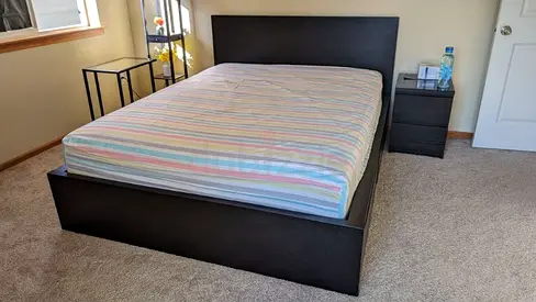 IKEA Malm Queen size bed frame with mattress.