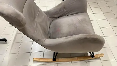 Light grey upholstered rocking lounge chair - good condition