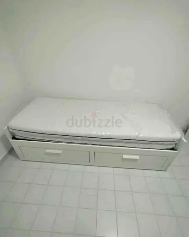 Ikea brimness Day bed frame with 2 big storage drawers underneath and with 2 Ikea mattresses is