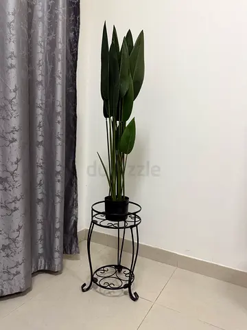 Artificial plant with stand