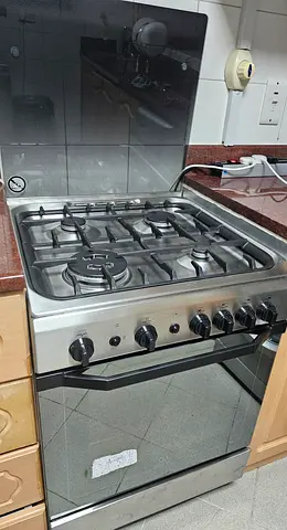 INDESIT Stainless Steel Gas Cooker with Oven - Good Working Condition