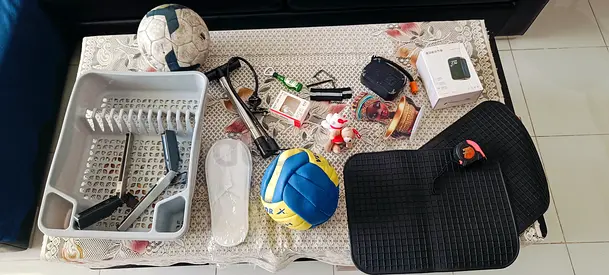 Mixed sports gear bundle — footballs, training pads, accessories (used)