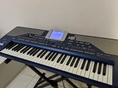 Keyboard Piano Expandable Synthesizer in Good Condition with Power Adaptor