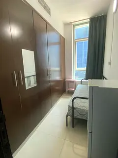 Single room with open window and big wardrobe near metro station