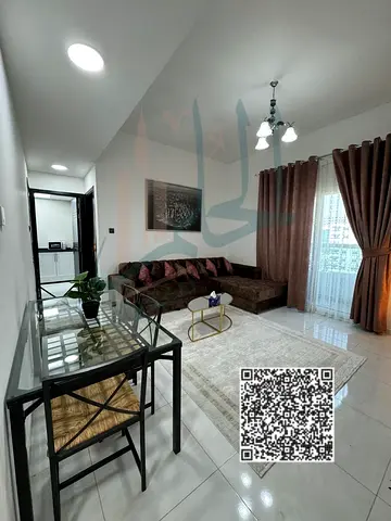 A great rental opportunity: one-bedroom hall apartment with two bathrooms, balcony, dedicated parking, and central air conditioning in Al Nakheel, sec