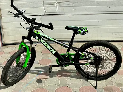 26” Green Bicycle  Mild usage Good Condition Includes: *Shock Absorber  *Bell Brand :VLRA Price: 200