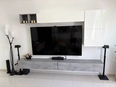 75-inch UHD HDR Smart TV , with full wall unit and Dolby atmos surround system