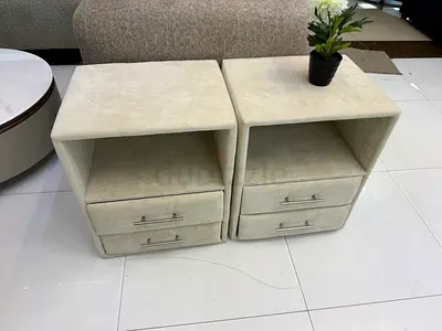 Pair of beige bedside tables with drawers