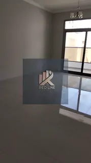 For annual rent: A prime two-bedroom apartment with a living room and balcony, offering a stunning v