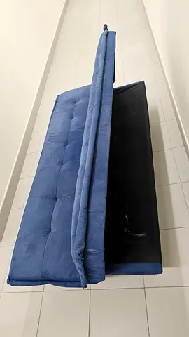 Blue convertible sofa bed / futon in good condition