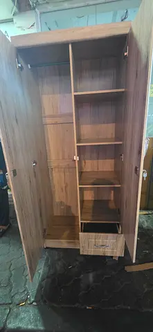 Used Wooden Wardrobe with Shelves and Drawer - Good Condition