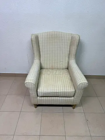 This chair is STRANDMON and features a light checkered pattern.